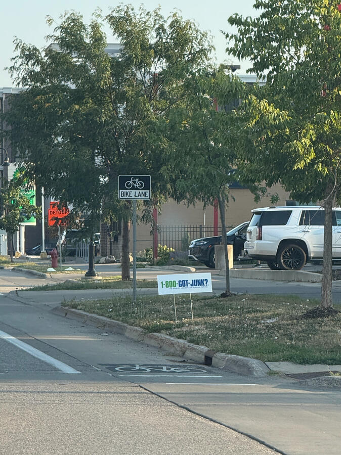 75th and Lyndale Advertising sign on a street corner